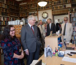 The Duke meets staff member Alison Todd, in the library's reception.
